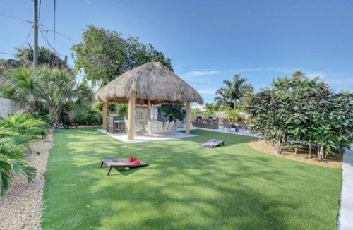 Harbor Village Villa | Walk to the beach & Resturant’s. Tiki Hut Dream Pool Home. Under a mile to beach