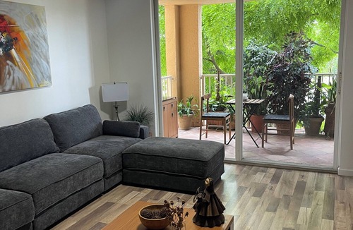 Aventura Apartment | Walking distance to Beach and Mall Cozy modern apartment relaxing view of trees