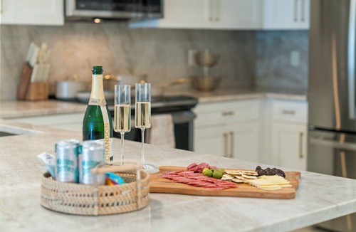 Imperial Point House | Waterfront 3 King Suites - Dock + Pool Near Beach - Paddleboards Included