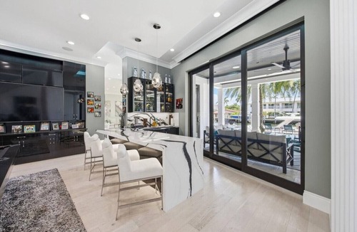 Las Olas Isles Villa | Waterfront 7BR Estate for 18 w/Infinity Pool, Spa, Private Dock, Wine Cellar