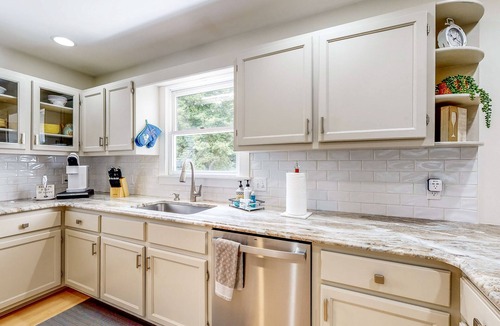 Salisbury House | Waterfront allergy-free home with 40-foot fishing dock, canoe, home theater