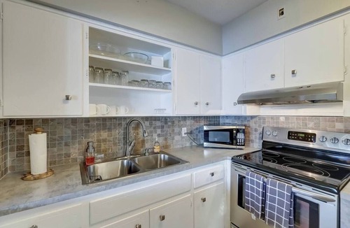 Middle River Terrace Apartment | Waterfront Apartment ~ Private Patio ~ Pool