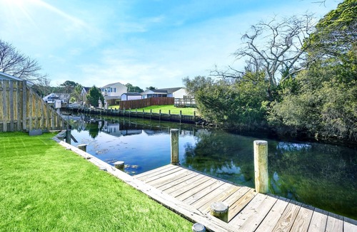 West Ocean City House | Waterfront Coastal Casual Home with Screened Deck + Boat Dock + Dog-Friendly!