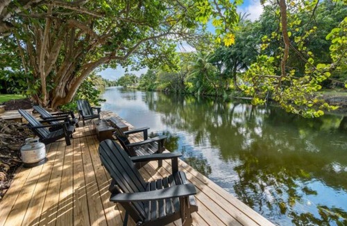 Golden Glades Villa | Waterfront Estate 7BR Heated pool Spa BBQ Basketball