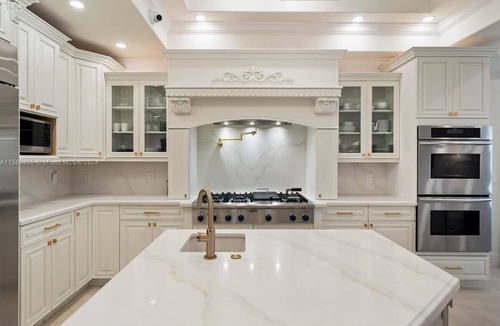 Eastern Shores House | Waterfront gated pool mansion.