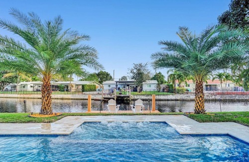North Corals House | Waterfront Heated Pool, Jacuzzi, Private Pier, 2mi to Beach