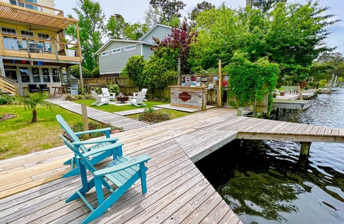 Colington Harbour House | Waterfront home and Oasis with private dock, outdoor bar and firepit