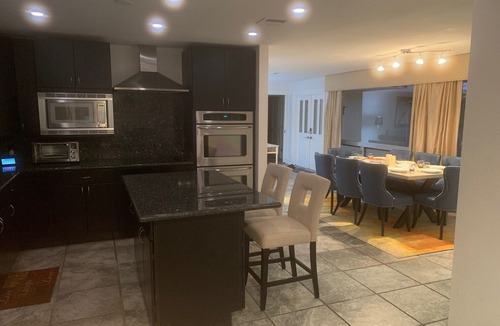 Coral Ridge Isles House | Waterfront Home with a Heated Pool 10 min to the Beach