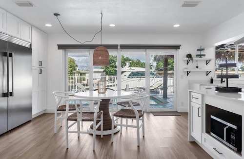 Pompano Isles House | Waterfront Home w/pool, hottub and TikiHut