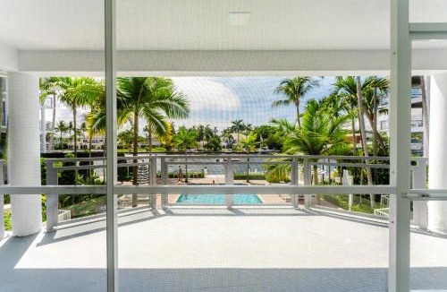 Boca Raton Apartment | Waterfront Retreat Views, Pool, Hot Tub, Gym Walk to Beach & Boca Resort!