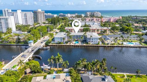 Boca Raton Apartment | Waterfront Retreat Views, Pool, Hot Tub, Gym Walk to Beach & Boca Resort!
