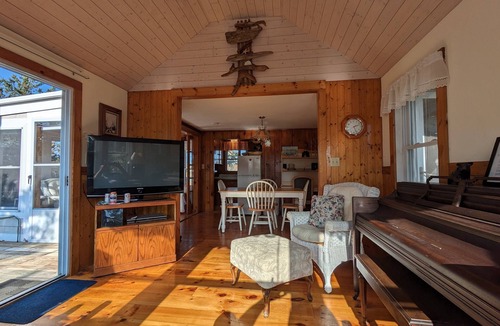 Centerville Cottage | Waterfront! Riverfront delight. 2 BR, private, decks. Steps to Craigville Beach
