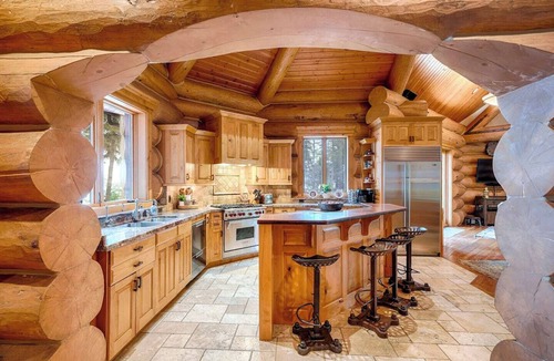 Marion House | Where lake days are long and everyone has a place to stay. Entire Estate property including the Large Custom Log Home and the Boat Motel on 50 Acres, Sleeping 26 Total