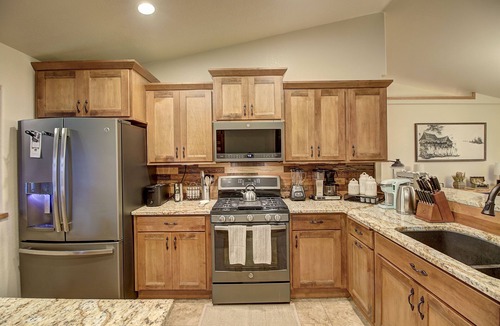 Whitefish House | Whitefish Luxury Escape w hot tub, fenced in yard, and fully stocked kitchen