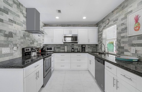 Royal Poinciana Villa | Your home in South Florida 4 bedrooms/3 full bath minutes from Hollywood beaches