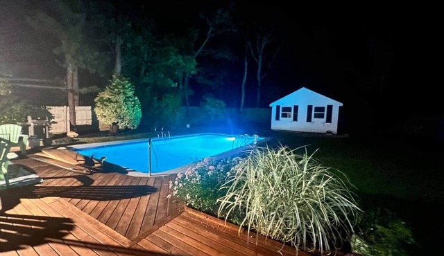 5-bedroom Cape with a pool and yard games.