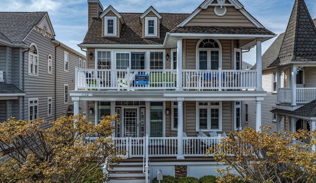 8BR/6BA Coastal Retreat w/Rooftop & Porch Walk to Beach