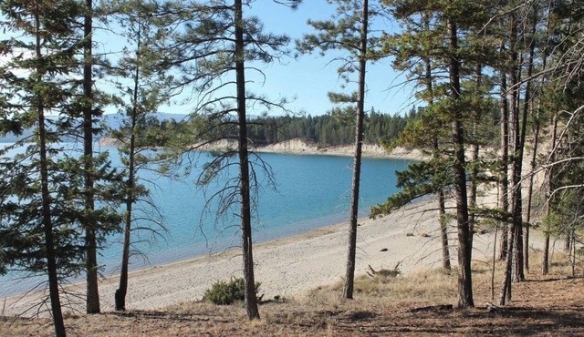 An amazing property on the West Kootenai. On 3.6 acres, this cabin is 2700 sq ft
