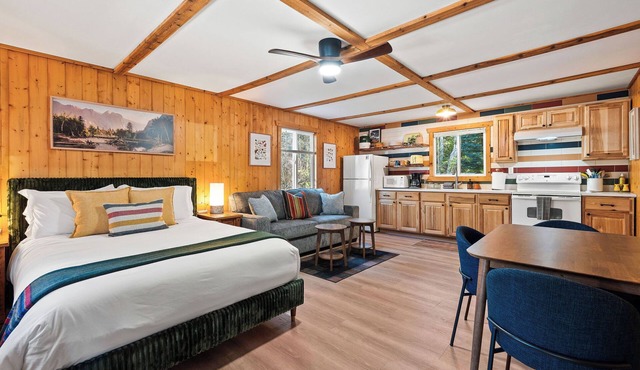 Authentic Montana log cabin, 15 min to Glacier. Queen bed + queen sofa bed, full kitchen & covered porch. Real adventure, real comfort, no tent required.