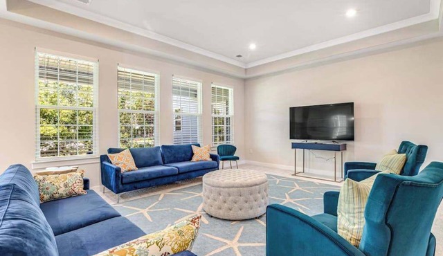 Beach retreat home with covered patio, W/D, fast WiFi, and central AC