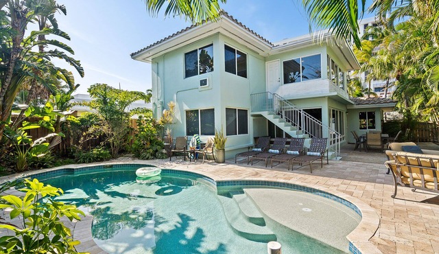 Beautiful Beach House with pool, lush tropical landscaping steps from the ocean
