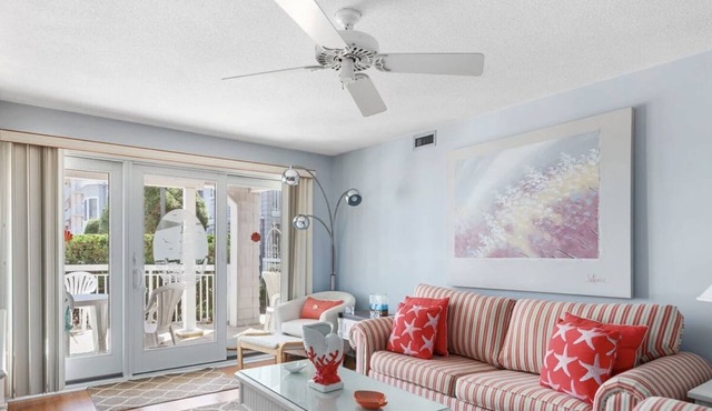 Beautiful Poolside Condo located across the street from the beach!