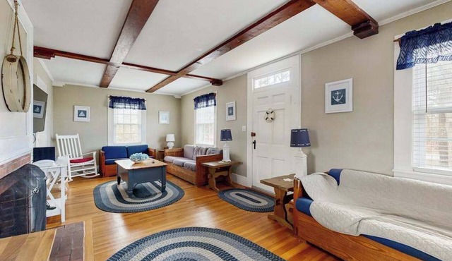 Bright family home close to beach with large yard, deck, games & dog friendly