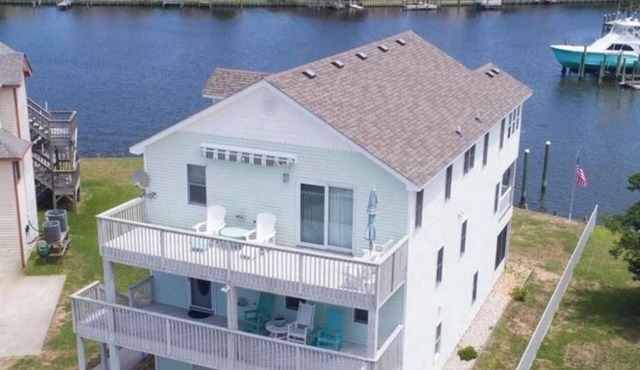 Canal Front Home with Private Dock, Multiple Decks & Hot Tub