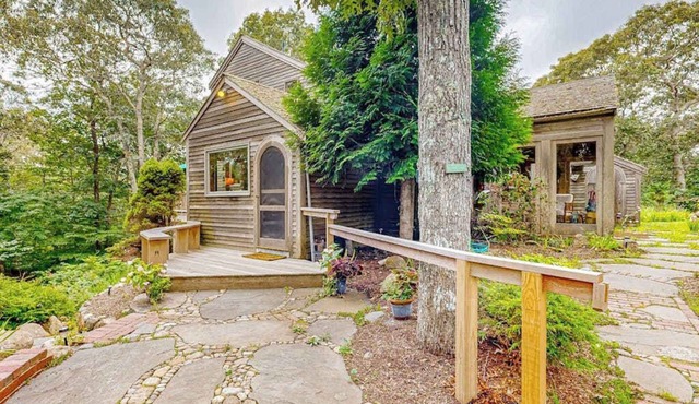 Charming 2-story house near the beach with inviting deck, large yard & canoe