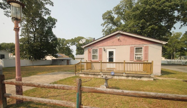 Charming vacation rental is nestled just a few blocks away from the Delaware Bay.