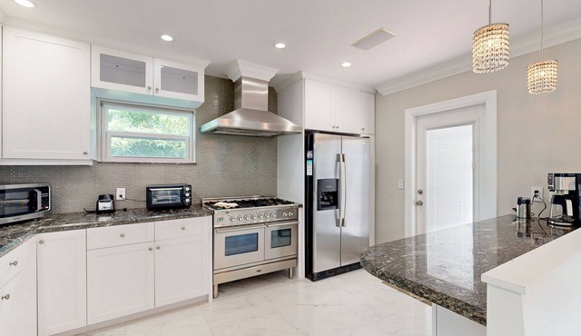 Cheerful retreat near beaches and nightlife with large patio, dog friendly