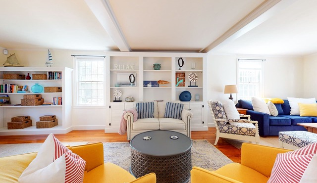 Classic Cape Cod home near beaches with yard, patio & outdoor fireplace