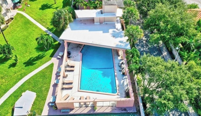 Condo w/Heated Pool and Steps to the Beach! Min 90-Day Rental