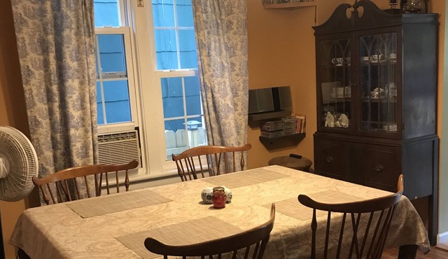 Cozy house on a quiet street with a charming deck! 5 minutes walk to NYC train!