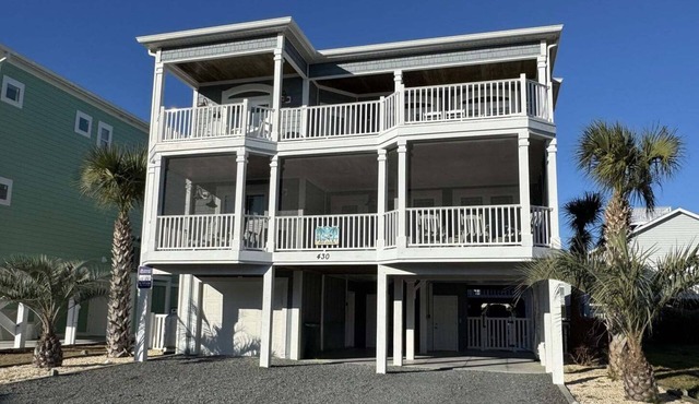 Discover The Lazy Pelican: a spacious 5BR home in Sunset Beach, perfect for family getaways.