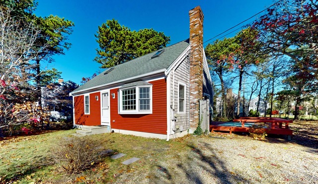Dog-friendly home near beaches with deck, grill, firepit, streaming, W/D, & AC