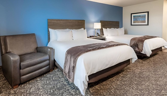 Extended Stay Comfort in Room with Full Kitchen Near Zing Zumm Children's Museum