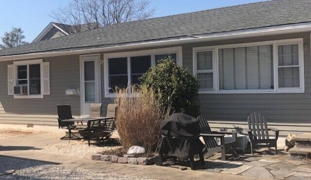 Great location. This ranch style duplex features two bedrooms and one bath. Window air conditioning and nice patio with gas grill, table and chairs. Off street parking. Just a short stroll to the beach and all that Stone Harbor has to offer! Pe