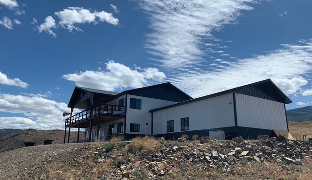 Hilltop Estate with Panoramic views looking upon thousands of acres.