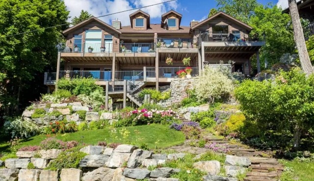 Lakefront haven with private lake access. Beautiful spacious two level townhome.
