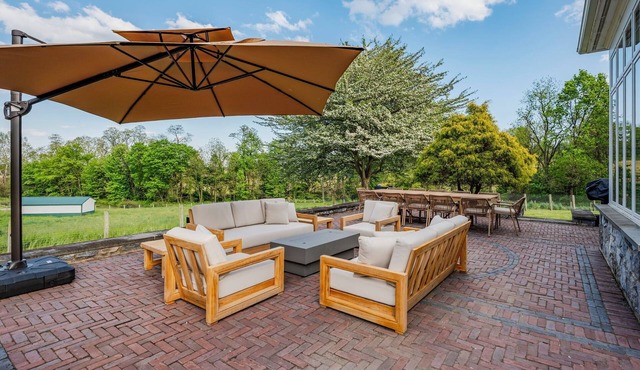 Legacy Lane Retreat sleeps up to 14 with tennis courts, pickleball courts, shuffleboard, fishing pond & more.