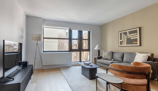 Lovely LES 1BR w/Gym, Doorman & W/D, nr Park, by Blueground