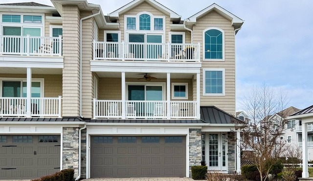 Luxurious coastal getaway with multiple balconies, patio, & stunning ocean views