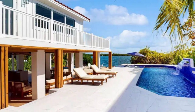 Luxury Oceanfront Estate | Private Dock Pool