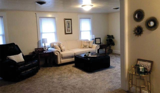 Newly renovated, and decorated upstairs apartment with attached garage.