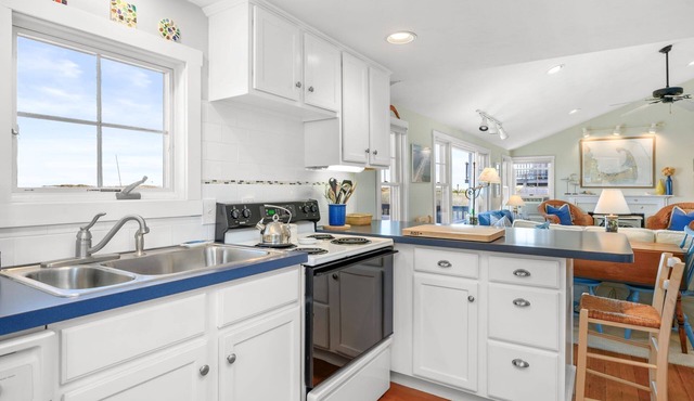 Oceanfront at Sagamore Beach with clean, crisp, Cape Cod interior and coastal furnishings