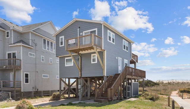 Oceanfront home w/elevator, private hot tub, shared pool, beach access, & WiFi