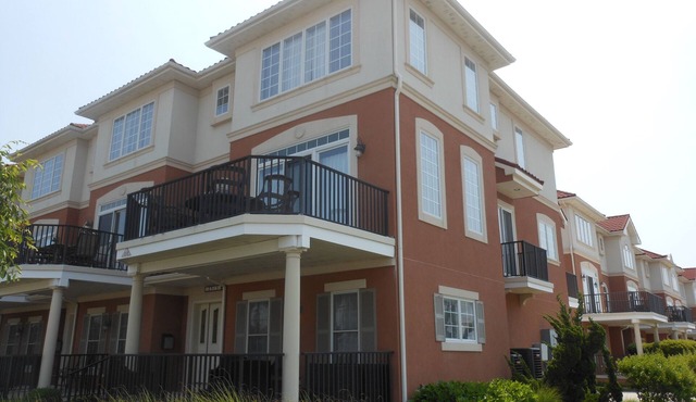 POOL! Beautiful beach block, end unit, three story town home at the highly desirable Thunderbird Condos,
