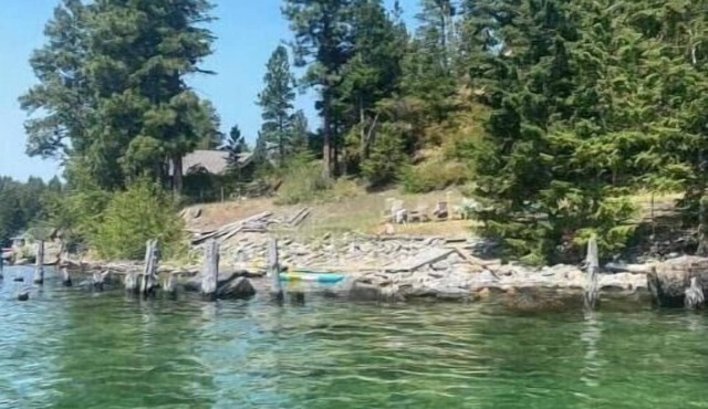 RARE FIND: Over 200' of Flathead Lake Lakefront with distinctive home