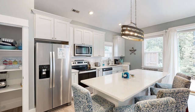 Relax in this inviting condo with pool